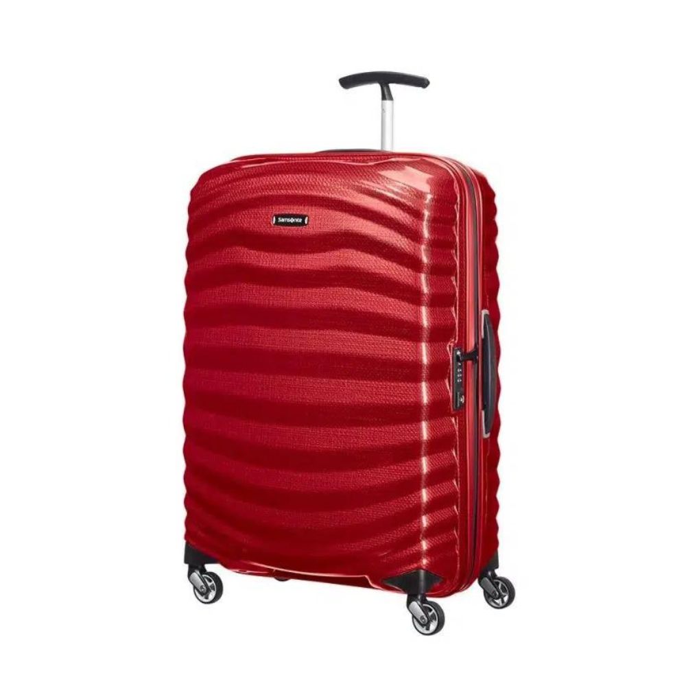 Resväska bäst i test samsonite lite-shock i röd metallic med svarta detaljer. Väskan står upp med handtaget delvis utdraget.