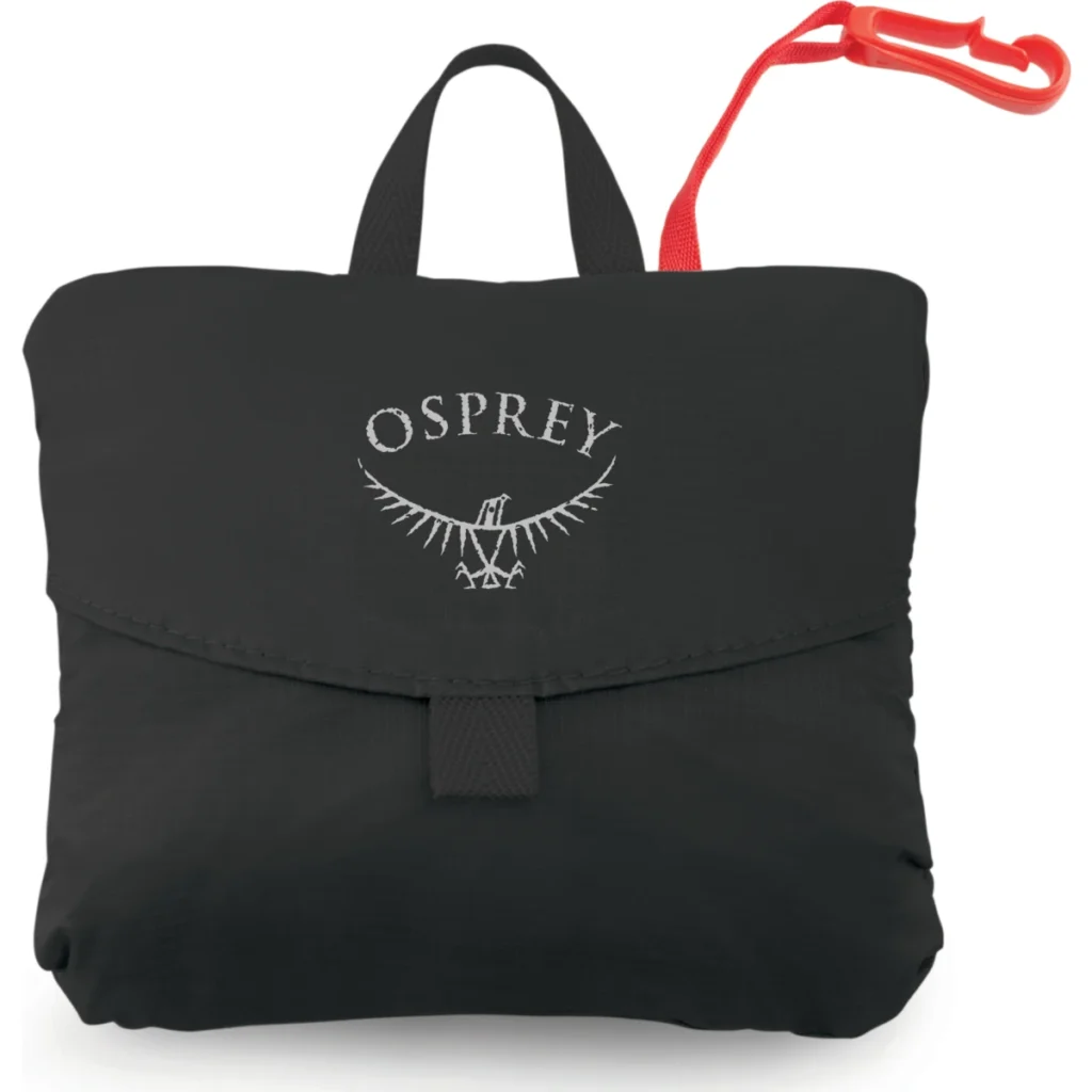Nedpackad Osprey Ultralight Stuff Pack. En svart påse med osprey logo och rött hängsnöre